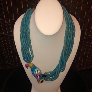 Vintage wood necklace with parrot handcarved